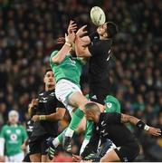9 July 2022; Will Jordan of New Zealand gets hit with the ball as he attempts to catch a high ball against Robbie Henshaw of Ireland during the Steinlager Series match between the New Zealand and Ireland at the Forsyth Barr Stadium in Dunedin, New Zealand. Photo by Brendan Moran/Sportsfile