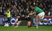 9 July 2022; Richie Mo'unga of New Zealand is tackled by Bundee Aki of Ireland during the Steinlager Series match between the New Zealand and Ireland at the Forsyth Barr Stadium in Dunedin, New Zealand. Photo by Brendan Moran/Sportsfile