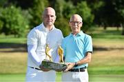 10 July 2022; Michael Finlan of Castle Golf Club, right, and his son Stephen Finlan of Grange Castle Golf Club, pictured with the trophy after winning the All Ireland Father & Son Foursomes 2022 – 60th Anniversary -  at Castle Golf Club in Rathfarnham, Dublin. Photo by Sam Barnes/Sportsfile