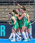 10 July 2022; Roisin Upton of Ireland, centre, is congratulated by teammates after scoring threir side's second goal during the FIH Women's Hockey World Cup 9th/10th Place Play-off match between Ireland and South Africa at Wagener Stadium in Amstelveen, Netherlands. Photo by Jeroen Meuwsen/Sportsfile