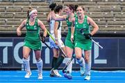 10 July 2022; Roisin Upton of Ireland, centre, celebrates with teammates Naomi Carroll, left, and Katie Mullan after scoring threir side's second goal during the FIH Women's Hockey World Cup 9th/10th Place Play-off match between Ireland and South Africa at Wagener Stadium in Amstelveen, Netherlands. Photo by Jeroen Meuwsen/Sportsfile
