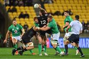 12 July 2022; Alex Nankivell of Maori All Blacks is tackled by Ciaran Frawley, left, and Gavin Coombes of Ireland during the match between the Maori All Blacks and Ireland at the Sky Stadium in Wellington, New Zealand. Photo by Brendan Moran/Sportsfile