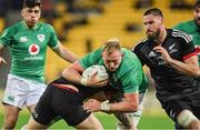 12 July 2022; Kieran Treadwell of Ireland is tackled by Connor Garden-Bachop, left, and Manaaki Selby-Rickit of Maori All Blacks during the match between the Maori All Blacks and Ireland at the Sky Stadium in Wellington, New Zealand. Photo by Brendan Moran/Sportsfile