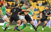 12 July 2022; Stuart McCloskey of Ireland is tackled by Billy Harmon, 7, and Josh Ioane of Maori All Blacks during the match between the Maori All Blacks and Ireland at the Sky Stadium in Wellington, New Zealand. Photo by Brendan Moran/Sportsfile