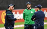 12 July 2022; Ireland players Paul Stirling and Andrew Balbirnie speak with coach Gary Wilson before the Men's One Day International match between Ireland and New Zealand at Malahide Cricket Club in Dublin. Photo by Harry Murphy/Sportsfile
