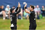 12 July 2022; Matt Henry of New Zealand, right, celebrates with teammate Henry Nicholls after bowling out Andrew Balbirnie of Ireland during the Men's One Day International match between Ireland and New Zealand at Malahide Cricket Club in Dublin. Photo by Harry Murphy/Sportsfile