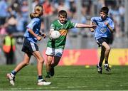 10 July 2022; Daragh Ó Sé, SN Cillín Liath Mastergeehy, Cahirciveen, Kerry, representing Kerry in action against Tomas Proudfoot, St Ultan's N.S., Bohermeen, Meath, representing Dublin during the INTO Cumann na mBunscol GAA Respect Exhibition Go Games at the GAA Football All-Ireland Senior Championship Semi-Final match between Dublin and Kerry at Croke Park in Dublin. Photo by Piaras Ó Mídheach/Sportsfile