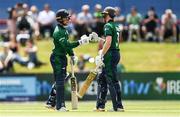 12 July 2022; Curtis Campher and Lorcan Tucker of Ireland fist bump during the Men's One Day International match between Ireland and New Zealand at Malahide Cricket Club in Dublin. Photo by Harry Murphy/Sportsfile