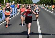 10 July 2022; Jacinta Linehan of Lucan Harriers AC, Dublin, celebrates finishing the Irish Runner 10 Mile, Sponsored by Sports Travel International, incorporating the AAI National 10 Mile Road Race Championships at the Phoenix Park in Dublin. Photo by Sam Barnes/Sportsfile