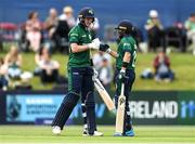 12 July 2022; George Dockrell and Simi Singh of Ireland fist bump during the Men's One Day International match between Ireland and New Zealand at Malahide Cricket Club in Dublin. Photo by Harry Murphy/Sportsfile