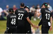 12 July 2022; Henry Nicholls of New Zealand, centre, celebrates with teammates the wicket of Simi Singh of Ireland during the Men's One Day International match between Ireland and New Zealand at Malahide Cricket Club in Dublin. Photo by Harry Murphy/Sportsfile
