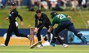12 July 2022; Mitchell Santner of New Zealand runs out Simi Singh of Ireland during the Men's One Day International match between Ireland and New Zealand at Malahide Cricket Club in Dublin. Photo by Harry Murphy/Sportsfile