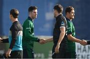 12 July 2022; George Dockrell of Ireland shakes hands with Jacob Duffy of New Zealand after the Men's One Day International match between Ireland and New Zealand at Malahide Cricket Club in Dublin. Photo by Harry Murphy/Sportsfile