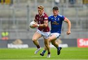 9 July 2022; Luke Loughlin of Westmeath in action against James Smith of Cavan during the Tailteann Cup Final match between Cavan and Westmeath at Croke Park in Dublin. Photo by Seb Daly/Sportsfile