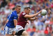 9 July 2022; Kieran Martin of Westmeath in action against Killian Clarke of Cavan on his way to scoring his side's second goal during the Tailteann Cup Final match between Cavan and Westmeath at Croke Park in Dublin. Photo by Seb Daly/Sportsfile