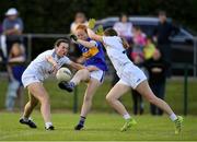 13 July 2022; Ciara Shelly of Tipperary in action against Niamh Murphy, left, and Heidi Lyons of Kildare during the 2022 All-Ireland U16 B Final between Kildare and Tipperary at Crettyard, Co. Laois. Photo by Ray McManus/Sportsfile