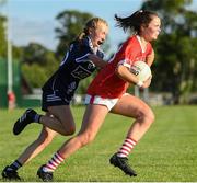 13 July 2022; Deirdre Cronin of Cork in action against Tessa Lambe of Dublin during the 2022 All-Ireland U16 A Final between Cork and Dublin at Cahir GAA Club, Co. Tipperary. Photo by George Tewkesbury/Sportsfile