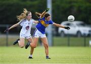 13 July 2022; Amy Reddan of Tipperary in action against Meabh McDonagh of Kildare during the 2022 All-Ireland U16 B Final between Kildare and Tipperary at Crettyard, Co. Laois. Photo by Ray McManus/Sportsfile