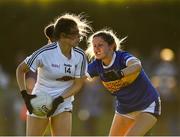 13 July 2022; Hannah Murphy of Kildare is tackled by Sinéad O'Carroll of Tipperary during the 2022 All-Ireland U16 B Final between Kildare and Tipperary at Crettyard, Co. Laois. Photo by Ray McManus/Sportsfile