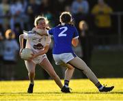 13 July 2022; Abaigh Cahill of Kildare is tackled by Ciara Redmond of Tipperary during the 2022 All-Ireland U16 B Final between Kildare and Tipperary at Crettyard, Co. Laois. Photo by Ray McManus/Sportsfile