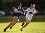 13 July 2022; Ellie Franklin of Tipperary in action against Abaigh Cahill  of Kildare during the 2022 All-Ireland U16 B Final between Kildare and Tipperary at Crettyard, Co. Laois. Photo by Ray McManus/Sportsfile