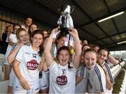 13 July 2022; Kildare captain Zara Hurley and her team mates with the cup after the 2022 All-Ireland U16 B Final between Kildare and Tipperary at Crettyard, Co. Laois. Photo by Ray McManus/Sportsfile