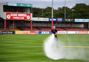 14 July 2022; Former Sligo Rovers player and current member of the Sligo County Fire Brigade Alan Keane waters the pitch before the UEFA Europa Conference League 2022/23 First Qualifying Round Second Leg match between Sligo Rovers and Bala Town at The Showgrounds in Sligo. Photo by Stephen McCarthy/Sportsfile