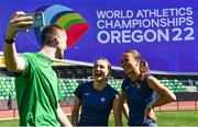 14 July 2022; Ireland mixed 4x400m relay team members, from left, Jack Raftery, Sophie Becker and Sharlene Mawdsley share a joke during the official training session before the World Athletics Championships at Hayward Field in Eugene, Oregon, USA. Photo by Sam Barnes/Sportsfile