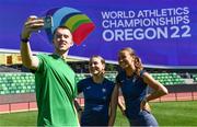 14 July 2022; Ireland mixed 4x400m relay team members, from left, Jack Raftery, Sophie Becker and Sharlene Mawdsley take a selfie during the official training session before the World Athletics Championships at Hayward Field in Eugene, Oregon, USA. Photo by Sam Barnes/Sportsfile