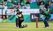 15 July 2022; Martin Guptill of New Zealand plays a shot to score a boundary, to bring up his half-century, during the Men's One Day International match between Ireland and New Zealand at Malahide Cricket Club in Dublin. Photo by Seb Daly/Sportsfile