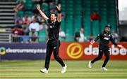 15 July 2022; Matt Henry of New Zealand celebrates taking the wicket of Ireland's Andrew Balbirnie, trapped ibw, during the Men's One Day International match between Ireland and New Zealand at Malahide Cricket Club in Dublin. Photo by Seb Daly/Sportsfile