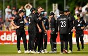 15 July 2022; Blair Tickner of New Zealand, third from left, is congratulated by teammates after dismissing Ireland's Curtis Campher, caught and bowled, during the Men's One Day International match between Ireland and New Zealand at Malahide Cricket Club in Dublin. Photo by Seb Daly/Sportsfile