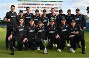 15 July 2022; New Zealand players celebrate with the trophy after their side's victory in the Men's One Day International match between Ireland and New Zealand at Malahide Cricket Club in Dublin. Photo by Seb Daly/Sportsfile