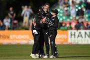 15 July 2022; New Zealand players, from left, Henry Nicholls, Blair Tickner and Tom Latham celebrate after their side's victory in the Men's One Day International match between Ireland and New Zealand at Malahide Cricket Club in Dublin. Photo by Seb Daly/Sportsfile