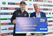 15 July 2022; Michael Bracewell of New Zealand is presented with his Player of the Series cheque by Cricket Ireland chief executive Warren Deutrom after the Men's One Day International match between Ireland and New Zealand at Malahide Cricket Club in Dublin. Photo by Seb Daly/Sportsfile