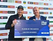 15 July 2022; Martin Guptill of New Zealand is presented with his Player of the Match cheque by Cricket Ireland chief executive Warren Deutrom after the Men's One Day International match between Ireland and New Zealand at Malahide Cricket Club in Dublin. Photo by Seb Daly/Sportsfile