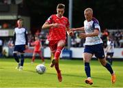 15 July 2022; Daniel Kelly of Dundalk in action against Tom Grivosti of St Patrick's Athletic during the SSE Airtricity League Premier Division match between St Patrick's Athletic and Dundalk at Richmond Park in Dublin. Photo by Ben McShane/Sportsfile