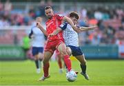 15 July 2022; Robbie Benson of Dundalk is tackled by Adam O'Reilly of St Patrick's Athletic during the SSE Airtricity League Premier Division match between St Patrick's Athletic and Dundalk at Richmond Park in Dublin. Photo by Ben McShane/Sportsfile