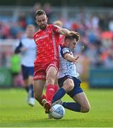 15 July 2022; Robbie Benson of Dundalk is tackled by Adam O'Reilly of St Patrick's Athletic during the SSE Airtricity League Premier Division match between St Patrick's Athletic and Dundalk at Richmond Park in Dublin. Photo by Ben McShane/Sportsfile