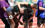 15 July 2022; Rhasidat Adeleke of Ireland, left, is congratulated by Chris O'Donnell after finishing second in the mixed 4x400m relay heats during day one of the World Athletics Championships at Hayward Field in Eugene, Oregon, USA. Photo by Sam Barnes/Sportsfile