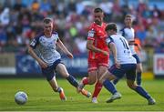 15 July 2022; Robbie Benson of Dundalk in action against Mark Doyle, left, and Adam O'Reilly of St Patrick's Athletic during the SSE Airtricity League Premier Division match between St Patrick's Athletic and Dundalk at Richmond Park in Dublin. Photo by Ben McShane/Sportsfile