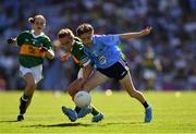 10 July 2022; Heidi Murray, St.Manchans N.S., Tubber, Moate, Offaly, representing Dublin, and Michaela O'Sullivan, Trafrask N.S., Adrigole, Beara, Cork, representing Kerry, and Kara O'Shea, Gaelscoil Uí Choimín, Cill Rois, Clare, representing Kerry, left, during the INTO Cumann na mBunscol GAA Respect Exhibition Go Games at the GAA Football All-Ireland Senior Championship Semi-Final match between Dublin and Kerry at Croke Park in Dublin. Photo by Ray McManus/Sportsfile