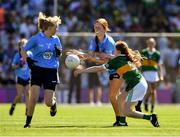 10 July 2022; Grace Moran, Glenville NS, Glenville, Cork, representing Dublin passes to Emily Broe, Lacken N.S., Lacken, Blessington, Wicklow, representing Dublin, under pressure from Orla McGee, Labasheeda N.S., Labasheeda, Clare, representing Kerry, during the INTO Cumann na mBunscol GAA Respect Exhibition Go Games at the GAA Football All-Ireland Senior Championship Semi-Final match between Dublin and Kerry at Croke Park in Dublin. Photo by Ray McManus/Sportsfile