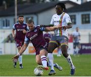 15 July 2022; Promise Omochere of Bohemians is tackled by Keith Cowan of Drogheda United during the SSE Airtricity League Premier Division match between Drogheda United and Bohemians at Head in the Game Park in Drogheda, Co Louth. Photo by George Tewkesbury/Sportsfile
