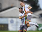 15 July 2022; Liam Burt of Bohemians, right, celebrates with team-mate Jordan Doherty after scoring their side's first during the SSE Airtricity League Premier Division match between Drogheda United and Bohemians at Head in the Game Park in Drogheda, Co Louth. Photo by George Tewkesbury/Sportsfile