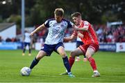 15 July 2022; Harry Brockbank of St Patrick's Athletic in action against John Martin of Dundalk during the SSE Airtricity League Premier Division match between St Patrick's Athletic and Dundalk at Richmond Park in Dublin. Photo by Ben McShane/Sportsfile