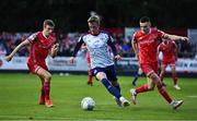15 July 2022; Chris Forrester of St Patrick's Athletic in action against Darragh Leahy, right, and Daniel Kelly of Dundalk during the SSE Airtricity League Premier Division match between St Patrick's Athletic and Dundalk at Richmond Park in Dublin. Photo by Ben McShane/Sportsfile