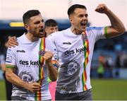 15 July 2022; Jordan Flores of Bohemians, right, celebrates with team mate Joshua Kerr after winning the SSE Airtricity League Premier Division match between Drogheda United and Bohemians at Head in the Game Park in Drogheda, Co Louth. Photo by George Tewkesbury/Sportsfile