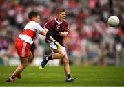 9 July 2022; Jamie Burns, St Marys N.S., Kilrusheighter, Templeboy, Sligo, representing Galway and Thomas Slowey, St Mary's P.S., Newtownbutler, Fermanagh, representing Derry  during the INTO Cumann na mBunscol GAA Respect Exhibition Go Games at half-time of the GAA Football All-Ireland Senior Championship Semi-Final match between Galway and Derry at Croke Park in Dublin. Photo by Ray McManus/Sportsfile