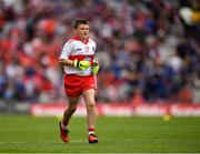 9 July 2022; Thomas Slowey, St Mary's P.S., Newtownbutler, Fermanagh, representing Derry  during the INTO Cumann na mBunscol GAA Respect Exhibition Go Games at half-time of the GAA Football All-Ireland Senior Championship Semi-Final match between Galway and Derry at Croke Park in Dublin. Photo by Ray McManus/Sportsfile